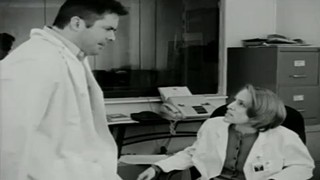 Dr Miller's relationship with his wife, Julia, has become strained John Yost and Kristin Pfeifer in Biophage(2010)