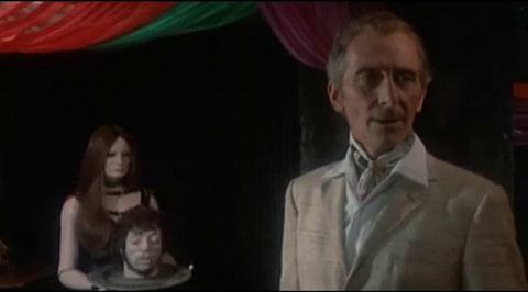 Peter Cushing Checks out the waxworks in a scene from The House That Dripped Blood (1971)