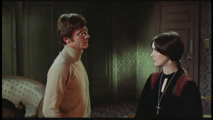 Roddy McDowell (as Fischer) and Pamela Franklin (as Tanner) in The Legend of Hell House