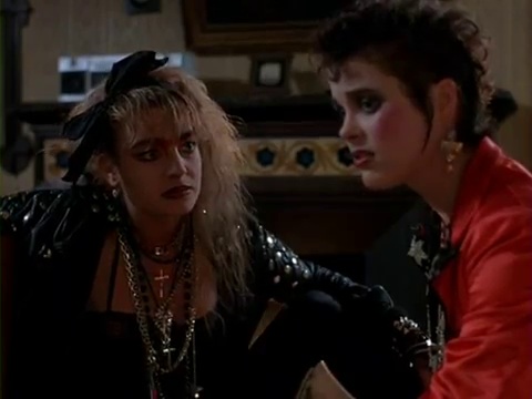 Bunty Bailey and Cassie Stuart in a Scene from Dolls (1987)