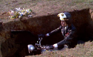 Nicky Henson in the burial scene from Psychomania (1971)