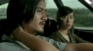 Ananda Everingham and Natthaweeranuch Thongmee in a scene from Shutter (2004)