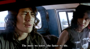 The final 2 survivors of the band decide what to do next in a scene from Pee chong air (2004)