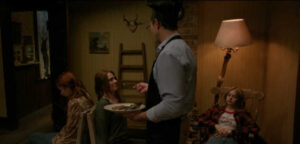 Forced cannibalism: Cassandra Sawtell, Brenna Llewellyn, Matthew MacCaull, and Amanda Fix in a scene from Lowlifes (2024)