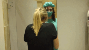 People in Fright Mob Costumes Scaring Unsuspecting Gym-Goers