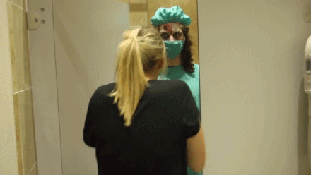 People in Fright Mob Costumes Scaring Unsuspecting Gym-Goers