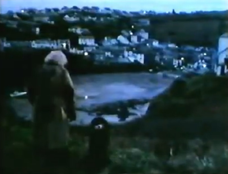 Tarry-Dan looks down to the village below Tarry-Dan looks down to the village below